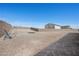 Spacious backyard with retaining walls and a partial soccer net, ideal for recreation at 8976 S Park St, Las Vegas, NV 89178