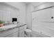Bright bathroom with a glass-enclosed shower and granite countertops at 8976 S Park St, Las Vegas, NV 89178