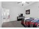 Comfortable bedroom with closet space and modern carpet flooring at 8976 S Park St, Las Vegas, NV 89178