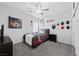 This bedroom features carpet and a modern ceiling fan at 8976 S Park St, Las Vegas, NV 89178