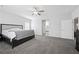 Spacious primary bedroom with plush carpet and ample natural light at 8976 S Park St, Las Vegas, NV 89178