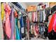 Well-organized closet with shelves and hanging rods, perfect for maximizing storage space at 8976 S Park St, Las Vegas, NV 89178