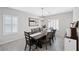 Inviting dining area features modern chandelier lighting and neutral tones at 8976 S Park St, Las Vegas, NV 89178