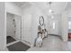 Inviting entryway with console table, stylish decor, and tile flooring at 8976 S Park St, Las Vegas, NV 89178