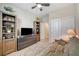 Bedroom featuring neutral walls, carpet, closet, and bookcase at 10255 Crimson Currant St, Las Vegas, NV 89143