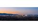 Panoramic night view of the city skyline illuminated against a twilight sky at 11 Rockstream Dr, Henderson, NV 89012