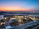 Modern luxury home with vibrant sunset views over the Las Vegas cityscape at 11 Rockstream Dr, Henderson, NV 89012