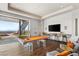 Fun game room with pool table, bar seating, and glass door to an outdoor stairway at 11 Rockstream Dr, Henderson, NV 89012