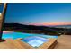 Inviting hot tub with an amazing mountain view and city skyline view at 11 Rockstream Dr, Henderson, NV 89012