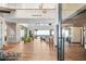 Open floor plan with high ceilings, wood floors, and floor to ceiling windows with panoramic views at 11 Rockstream Dr, Henderson, NV 89012