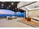 Main bedroom transitions to a covered patio offering expansive city and mountain views at 11 Rockstream Dr, Henderson, NV 89012