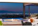 Enjoy stunning city views from the comfort of your living room and backyard pool area at 11 Rockstream Dr, Henderson, NV 89012