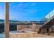 Outdoor hot tub featuring stunning city views and a cozy fire pit, perfect for evening relaxation and enjoying the scenery at 11 Rockstream Dr, Henderson, NV 89012