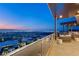 Spacious outdoor patio with seating offers breathtaking panoramic city views, perfect for enjoying sunsets and evening gatherings at 11 Rockstream Dr, Henderson, NV 89012
