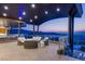 Covered terrace with city views and a comfortable lounge area at 11 Rockstream Dr, Henderson, NV 89012
