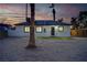 Spacious backyard with artificial grass and a newly constructed wooden fence for privacy at 1209 S 17Th St, Las Vegas, NV 89104