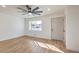 Bright and open living room with new flooring, a large window, and a neutral color palette at 1209 S 17Th St, Las Vegas, NV 89104