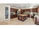 Spacious kitchen with granite counters, a center island, and stainless steel appliances at 1265 Vietti St, Henderson, NV 89012