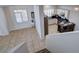 Overhead view showcasing the kitchen, dining area, and entryway from the staircase landing at 1420 Ibizo St, Las Vegas, NV 89117