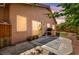 Backyard featuring desert landscaping and an outdoor kitchen at 1562 Pimlico Hills St, Henderson, NV 89014