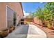 Backyard featuring desert landscaping and an outdoor kitchen at 1562 Pimlico Hills St, Henderson, NV 89014