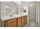 Bathroom featuring a double sink vanity and tiled floors at 1562 Pimlico Hills St, Henderson, NV 89014