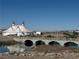 Modern white and red circus tent beside a bridge on a river at 1562 Pimlico Hills St, Henderson, NV 89014