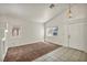 Cozy living room featuring neutral carpet and a bright window at 1562 Pimlico Hills St, Henderson, NV 89014