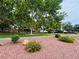 A landscaped park area with colorful flowers and plants offering a peaceful spot for relaxation and community enjoyment at 1562 Pimlico Hills St, Henderson, NV 89014