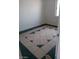 Bedroom with decorative tile floor, a window, and ample space at 1902 Weldon Pl, Las Vegas, NV 89104