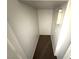 A small closet featuring carpet flooring and an electrical box at 1920 Hodgenville St # 106, Las Vegas, NV 89106