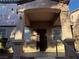 Inviting entrance with covered porch and security door for added safety and curb appeal at 1920 Hodgenville St # 106, Las Vegas, NV 89106
