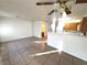 Open floor plan connecting the living room to the kitchen, ideal for entertaining and everyday living at 1920 Hodgenville St # 106, Las Vegas, NV 89106