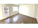 Cozy living room space with tile flooring and easy access to an outdoor patio or balcony at 1920 Hodgenville St # 106, Las Vegas, NV 89106
