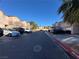 Street view of a complex with parking and a palm tree at 1920 Hodgenville St # 106, Las Vegas, NV 89106