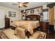 Bedroom with wood floors, ceiling fan, and luxurious furnishings at 1920 Silver St, Pahrump, NV 89048