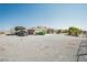 Single-story house with a large, gravel-covered front yard and covered parking on the left at 1920 Silver St, Pahrump, NV 89048