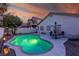 Inviting backyard pool area with outdoor seating, ideal for entertaining at 254 Camelback Ridge Ave, Henderson, NV 89012