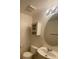 Bright bathroom features a white vanity with modern fixtures and medicine cabinet at 2637 Heathrow St, Las Vegas, NV 89135