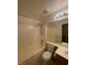 A clean bathroom features a tub and shower combo, a vanity, and a toilet at 2637 Heathrow St, Las Vegas, NV 89135