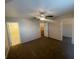 The bedroom features neutral walls, carpet, and a ceiling fan with a light fixture at 2637 Heathrow St, Las Vegas, NV 89135