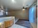 Open dining area with wood floors, ceiling fan and sliding glass doors at 2637 Heathrow St, Las Vegas, NV 89135