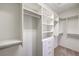 Spacious walk-in closet features custom shelving and ample storage at 2747 White Sage Dr, Henderson, NV 89052