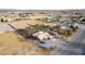 Expansive residential lot featuring a home, RV, boat, and desert landscaping in a suburban neighborhood at 3051 S Rainbow Ave, Pahrump, NV 89048