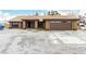 Charming single-story home with a well-maintained desert landscape and tile roof at 3051 S Rainbow Ave, Pahrump, NV 89048