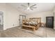 Bright bedroom featuring a unique wood bed frame and neutral décor at 3051 S Rainbow Ave, Pahrump, NV 89048