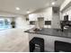 Open kitchen area with a view of the backyard pool and sliding glass doors at 308 Cannes St, Henderson, NV 89015