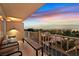 Cozy balcony with seating area and scenic views of neighborhood at 3111 Bel Air Dr # 7D, Las Vegas, NV 89109