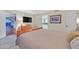 This bedroom features modern furnishings and ensuite bath at 3111 Bel Air Dr # 7D, Las Vegas, NV 89109
