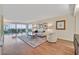 Bright and airy living room with hardwood floors, ample light, and views at 3111 Bel Air Dr # 7D, Las Vegas, NV 89109